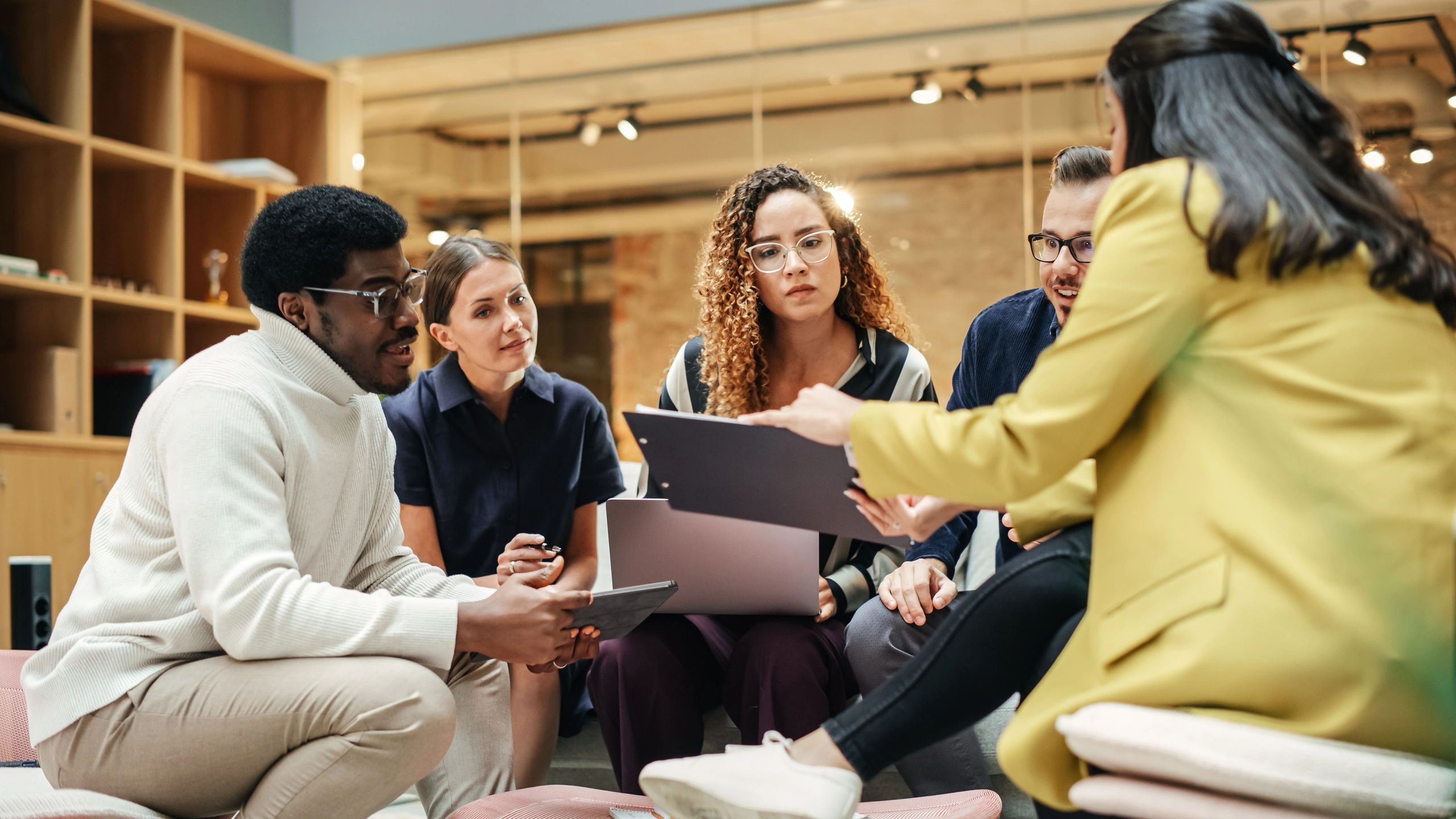 Team workshop discussion in a modern office